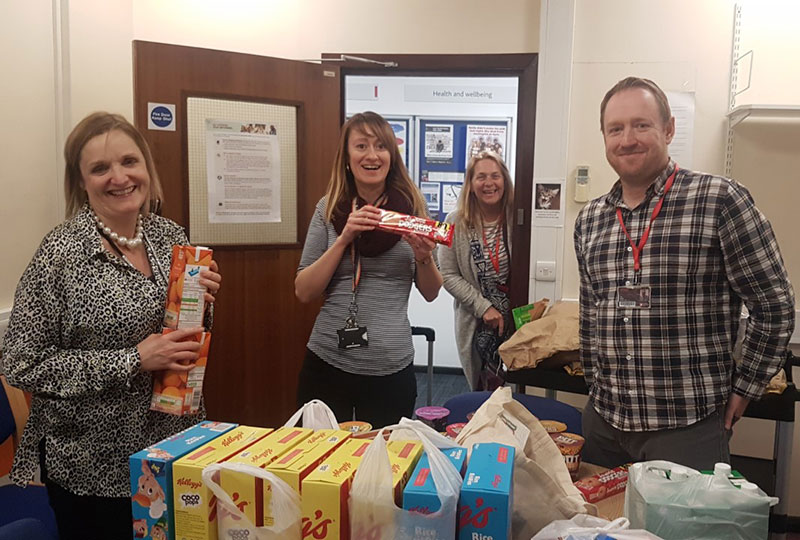 Solent's student services team with food supplies for students