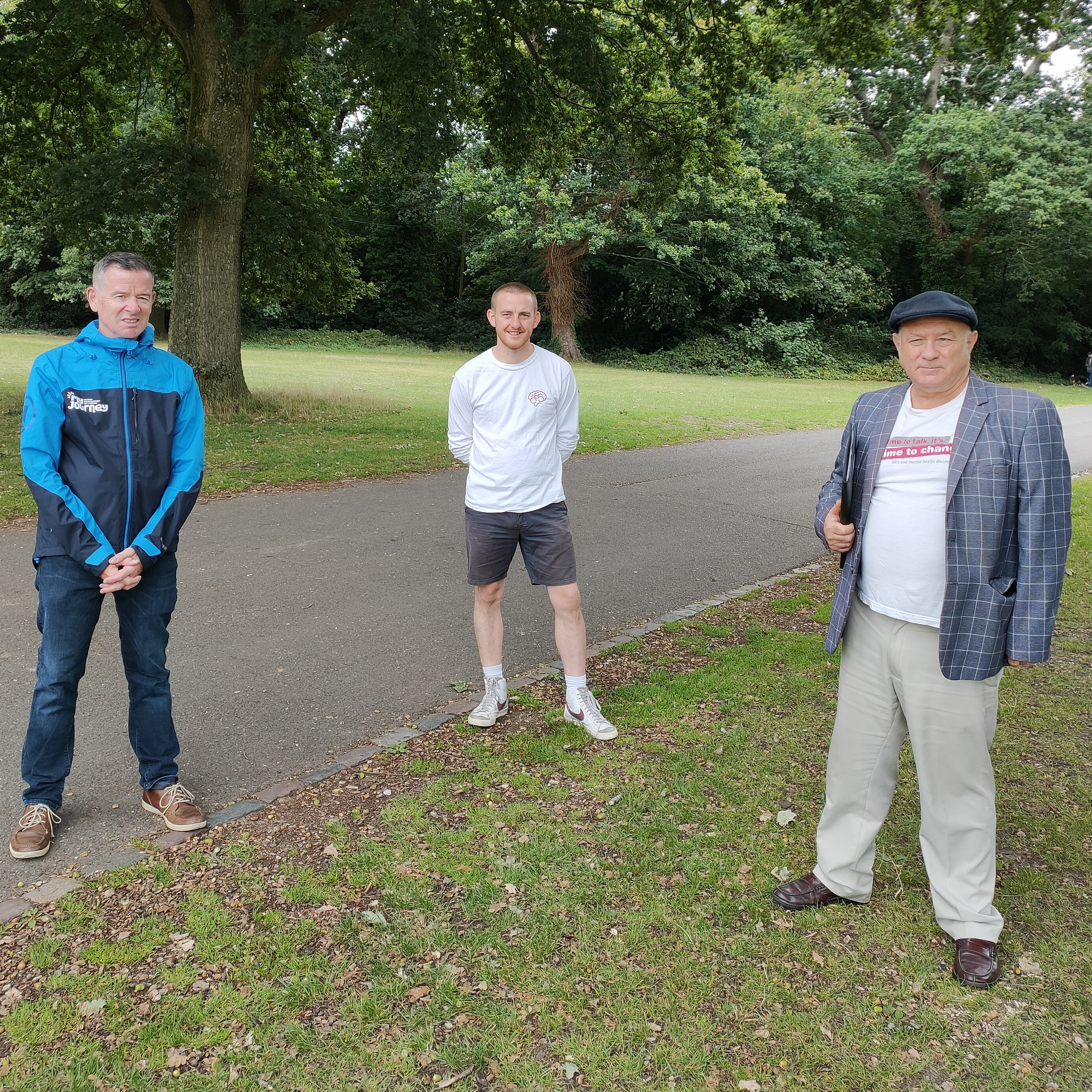 Harrison pictured with two men who feature in his documentary
