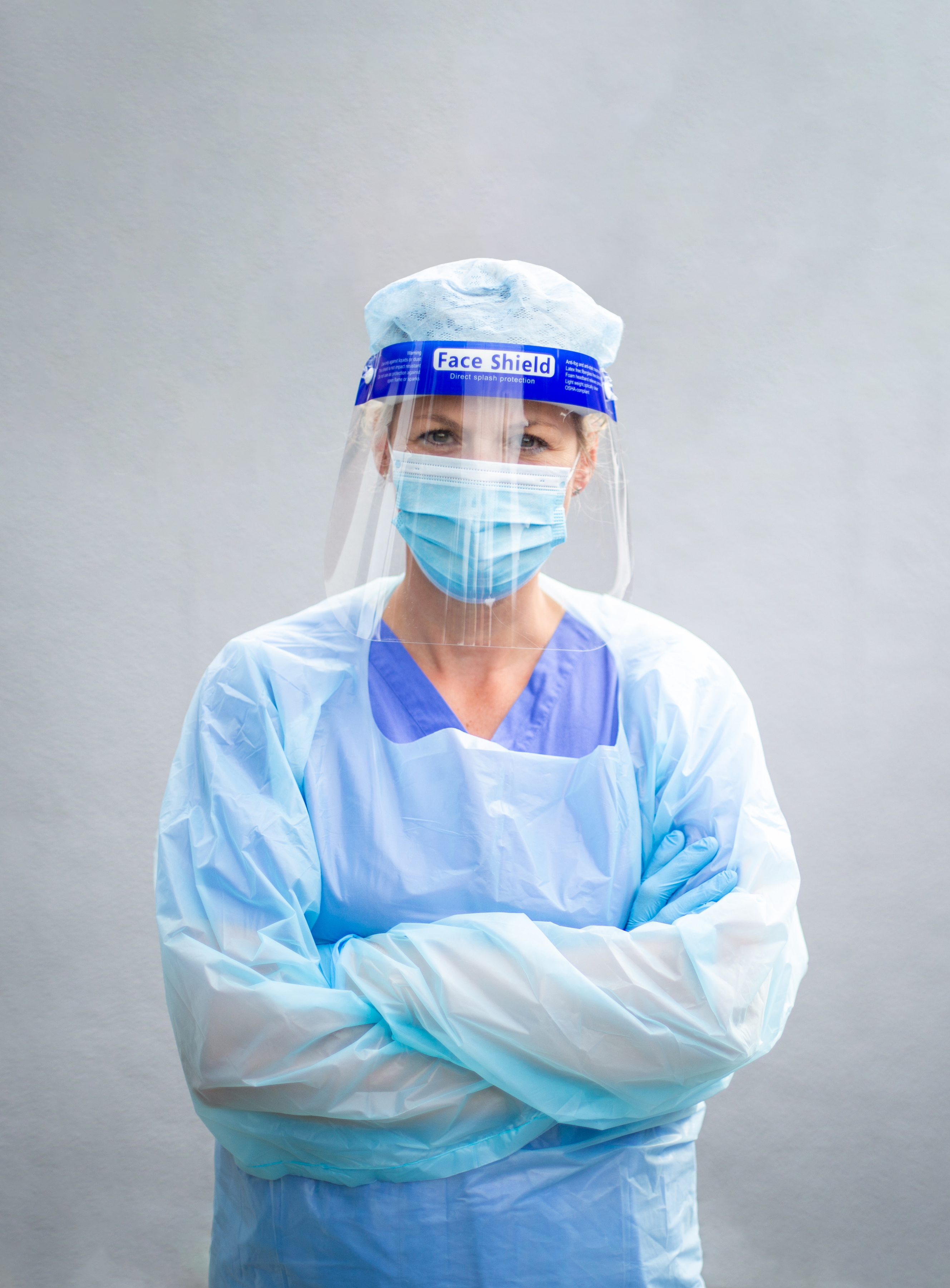 Picture from Jan Pavelka's book, showing a nurse in full ppe 