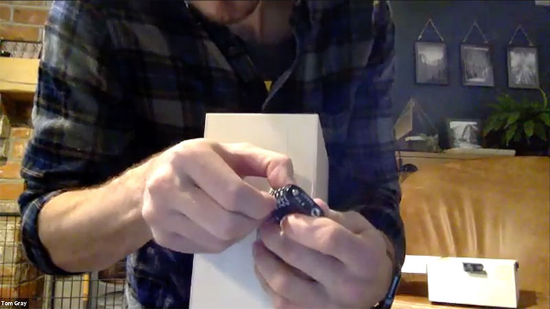 Lecturer, Tom Gray holding a padlock