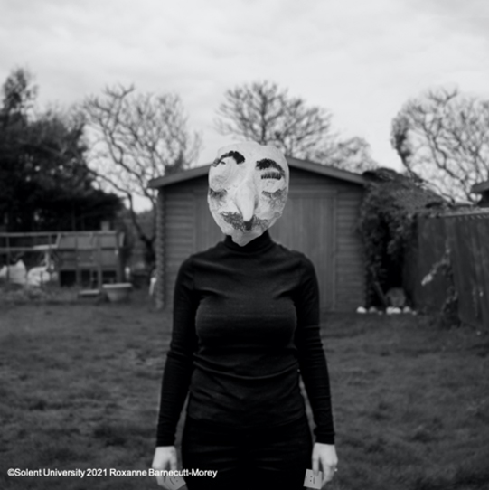 Image of person wearing a mask