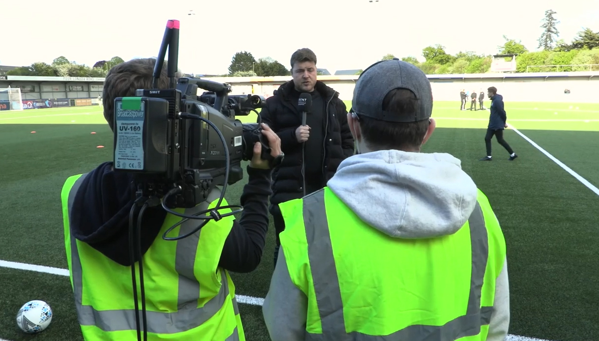 Picture shows students working at Hampshire FA match, filming and presenting
