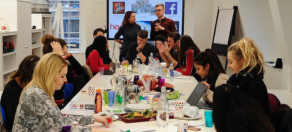 Advertising students in a meeting room at 7stars