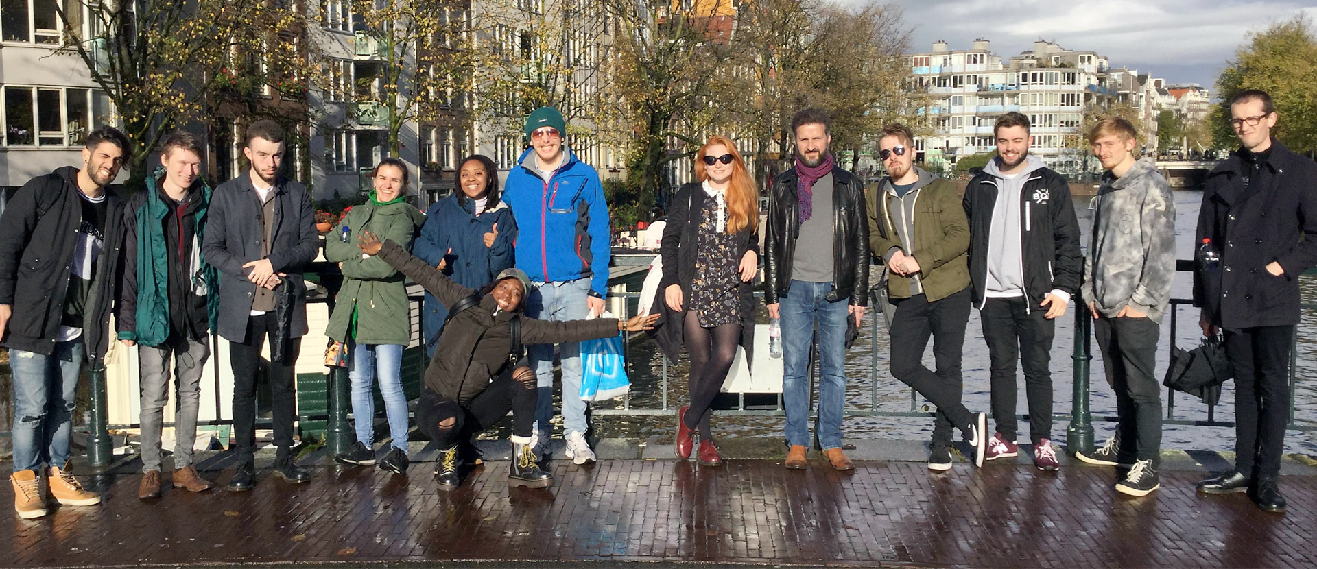 Solent's music students on a bridge over a canal in Amsterdam