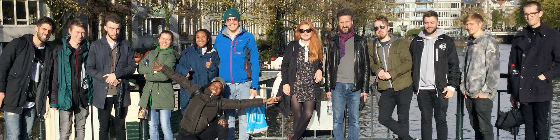 Solent's music students on a bridge over a canal in Amsterdam