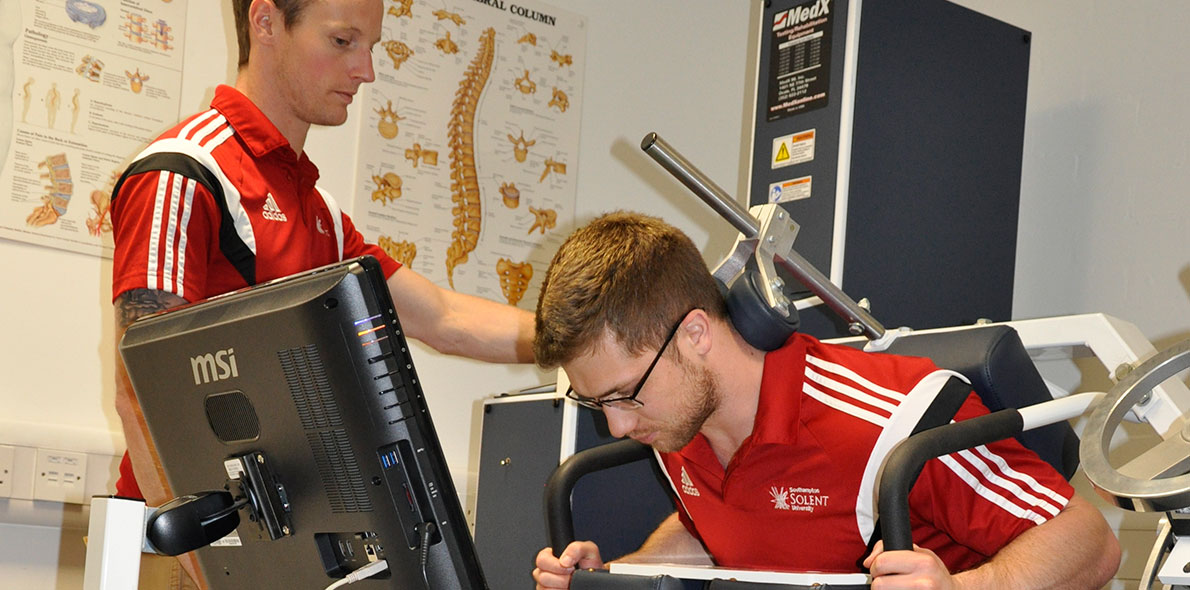 Dr James Steele with a participant in his back pain research study