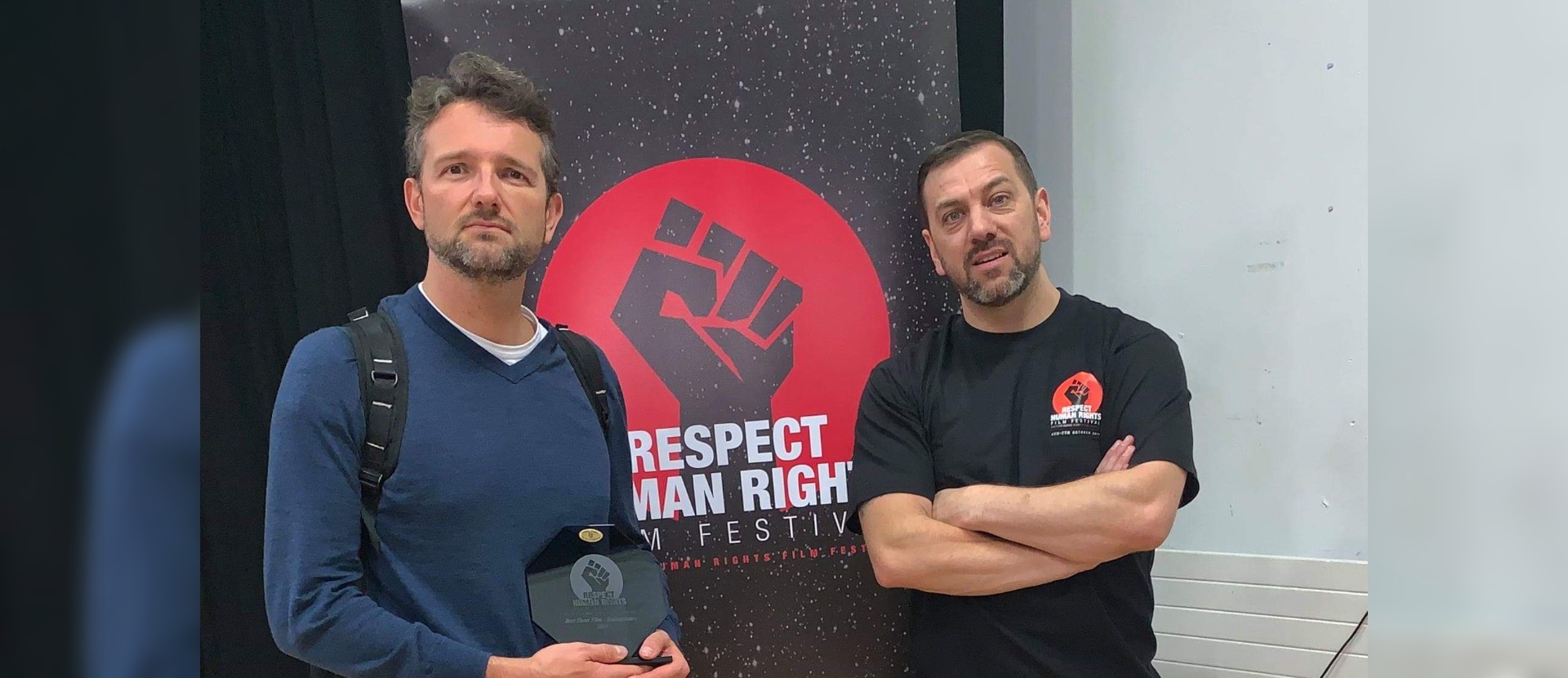 Picture of Terence McSweeney holding the award at the Belfast Human Rights Festival