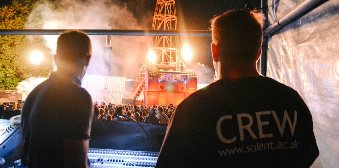 Solent crew working behind the scenes at a festival