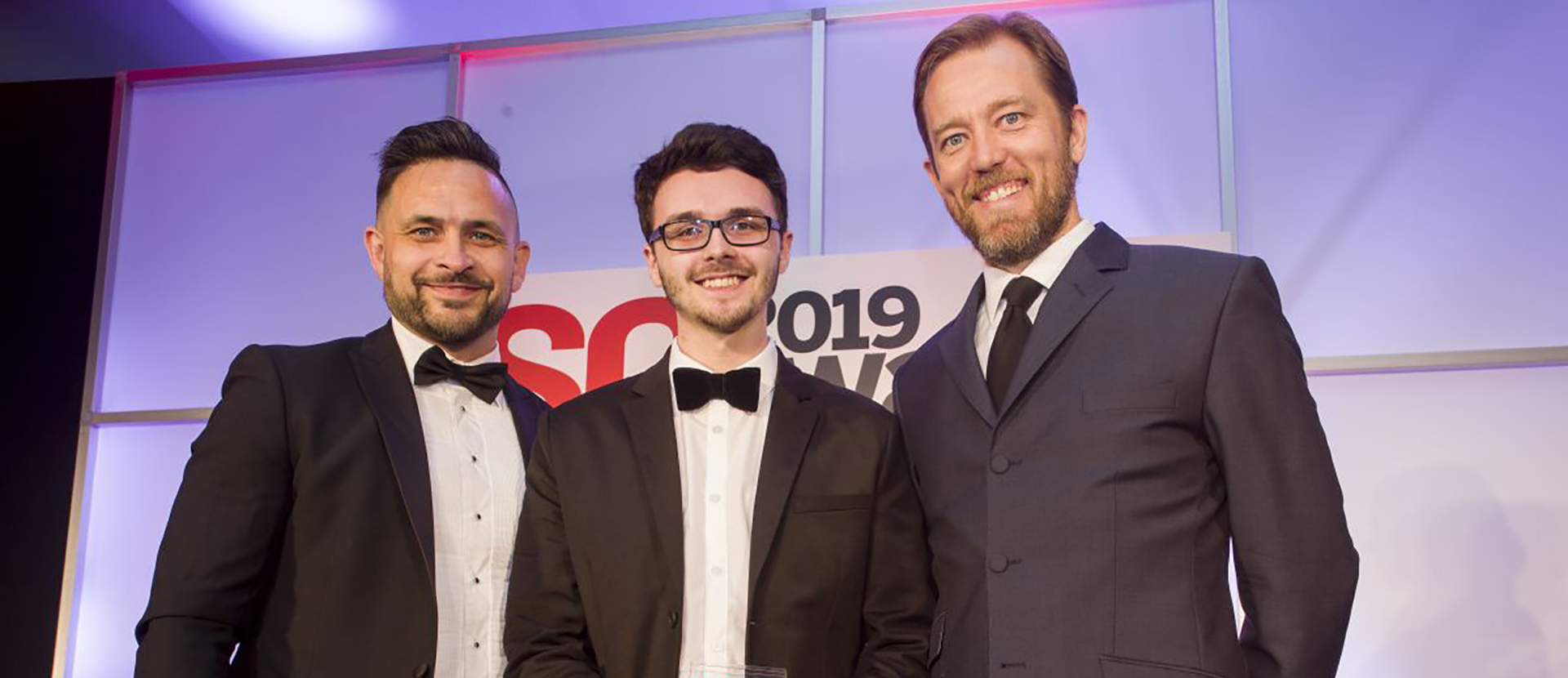 Picture of Elliott Simmonds receiving his award for Cybersecurity student of the year