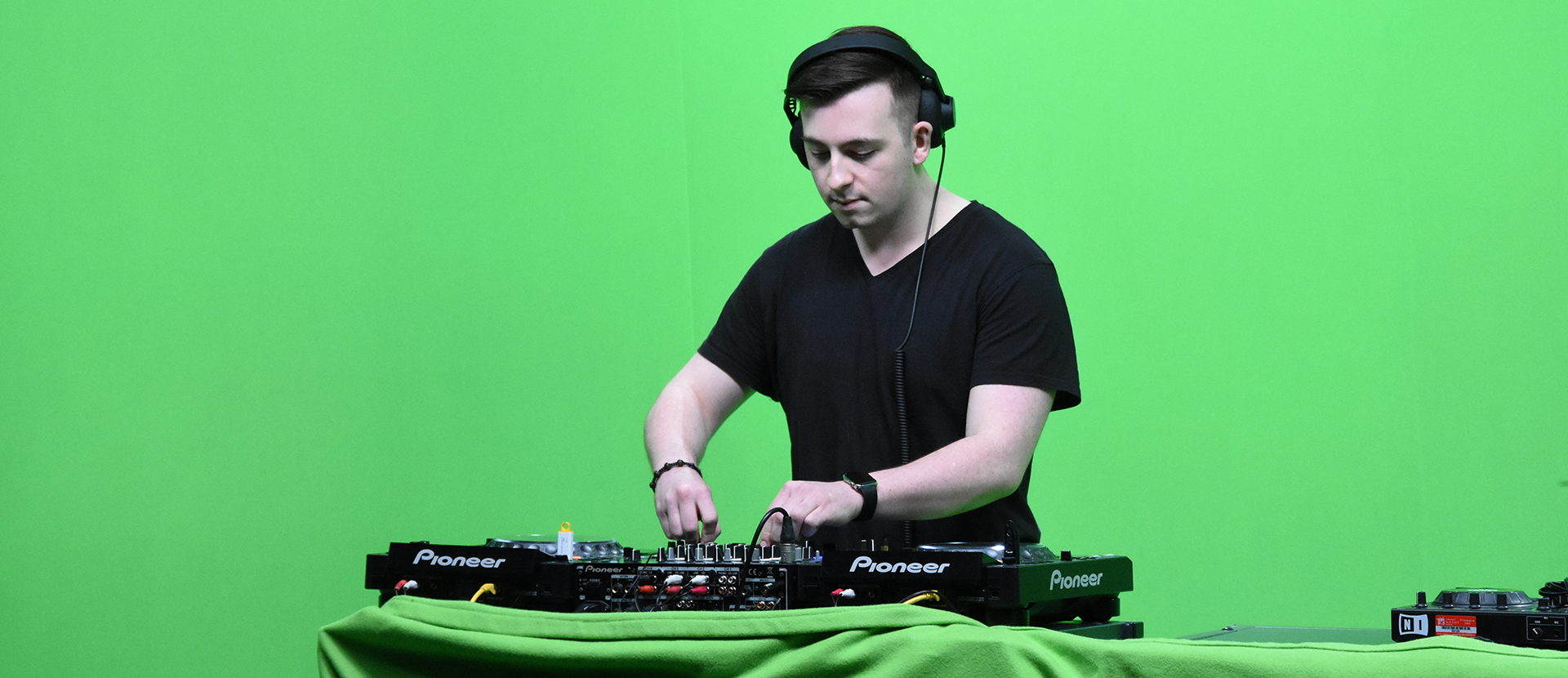 A digital music student DJing