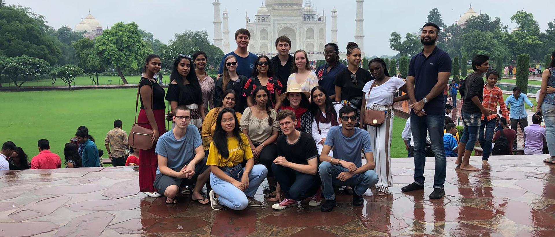 Enactus students outside the Taj Mahal
