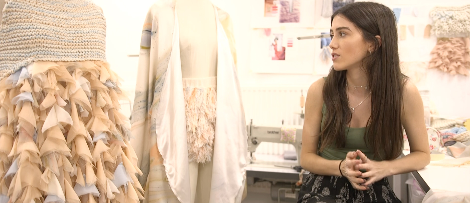 A Solent fashion student with some of her degree show garments