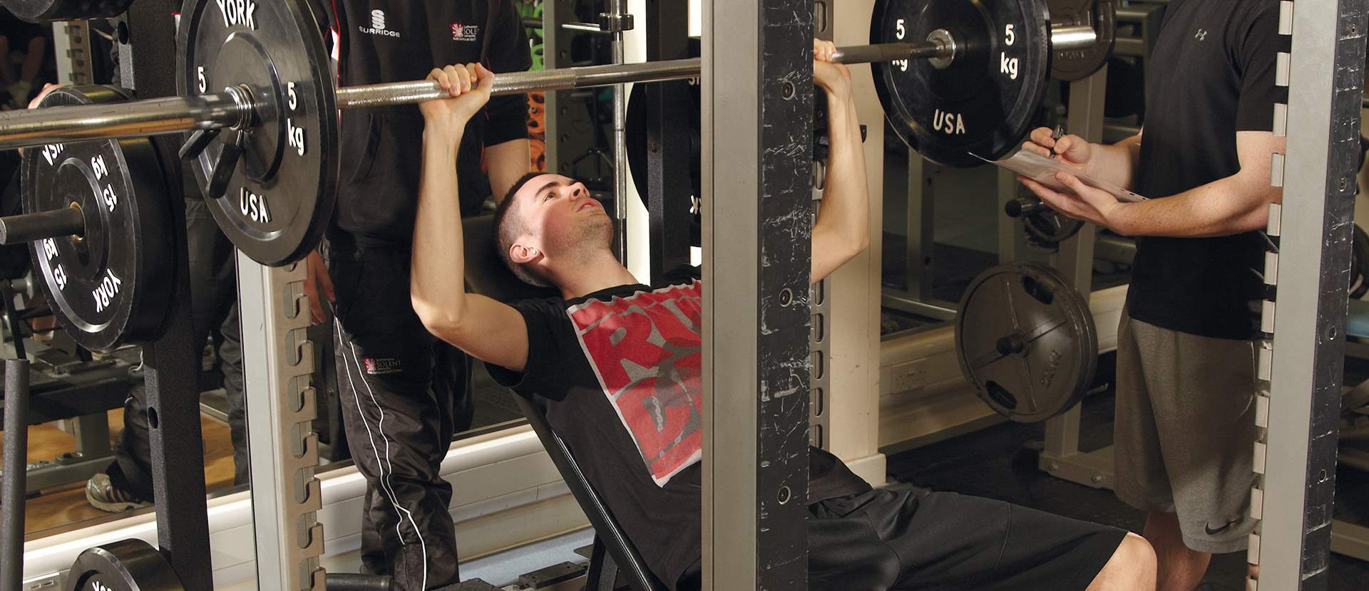 A person using weights in the gym