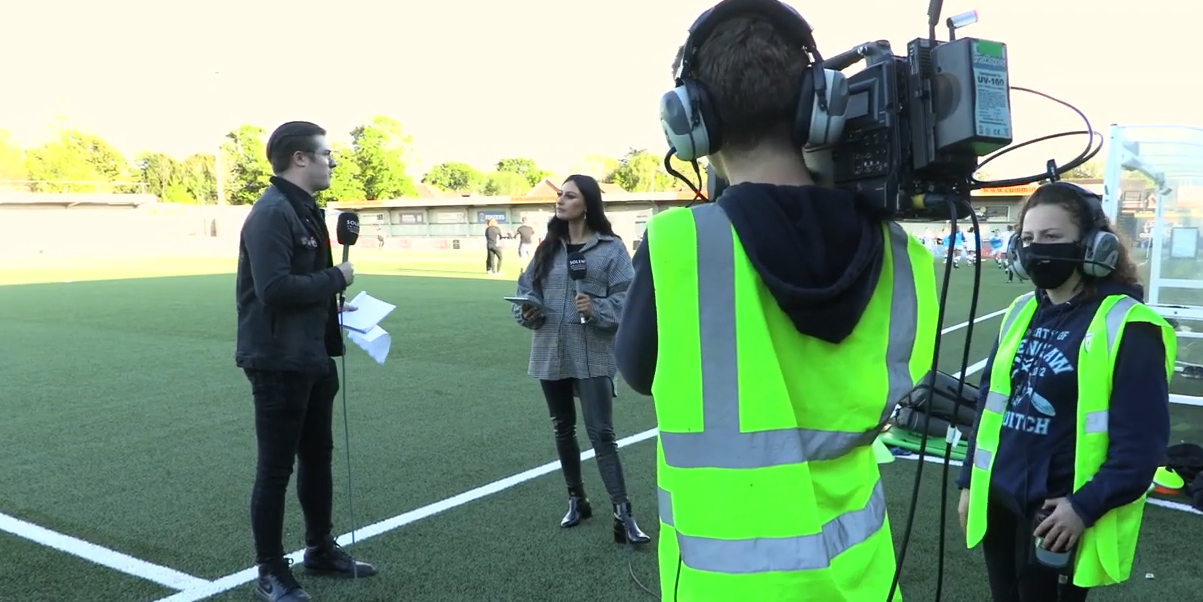 Picture shows students working at Hampshire FA match, filming and presenting