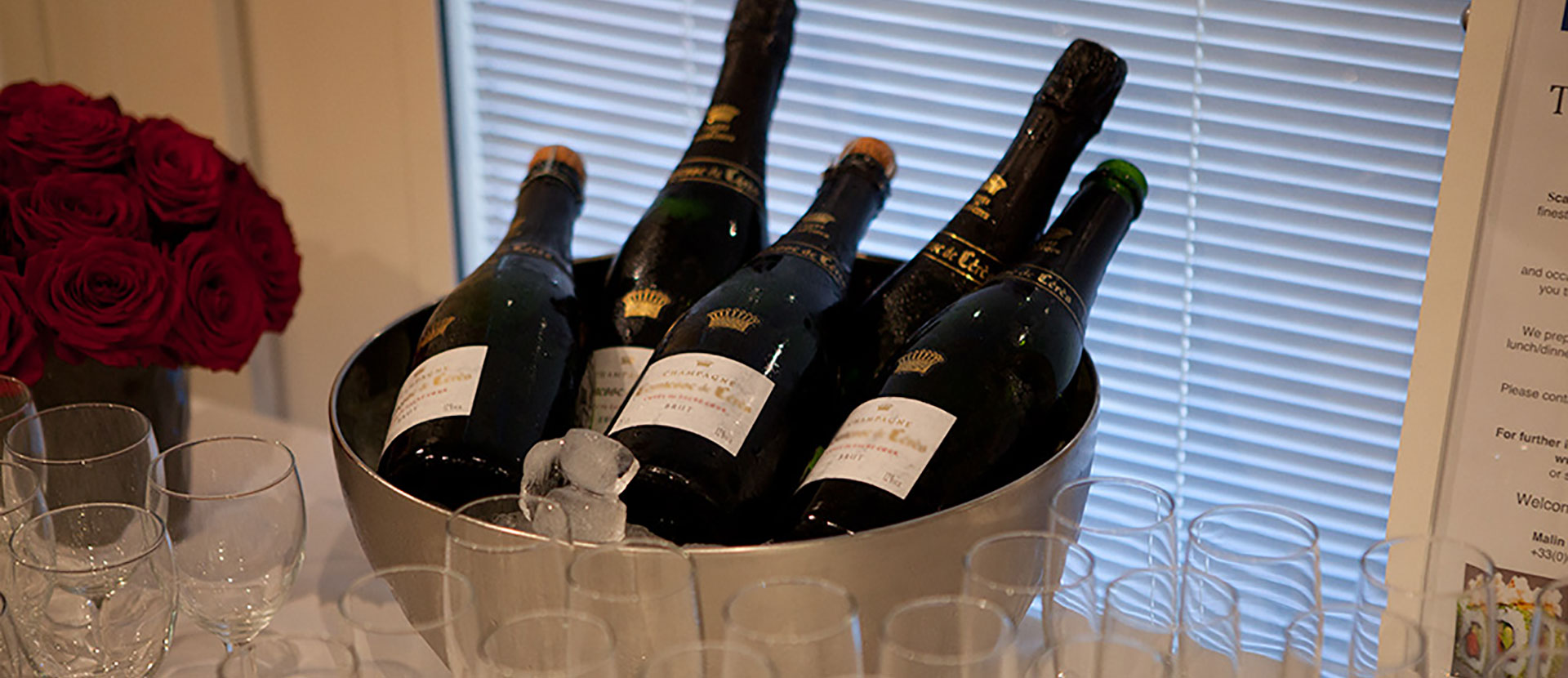 Bottles of champagne in an ice bucket