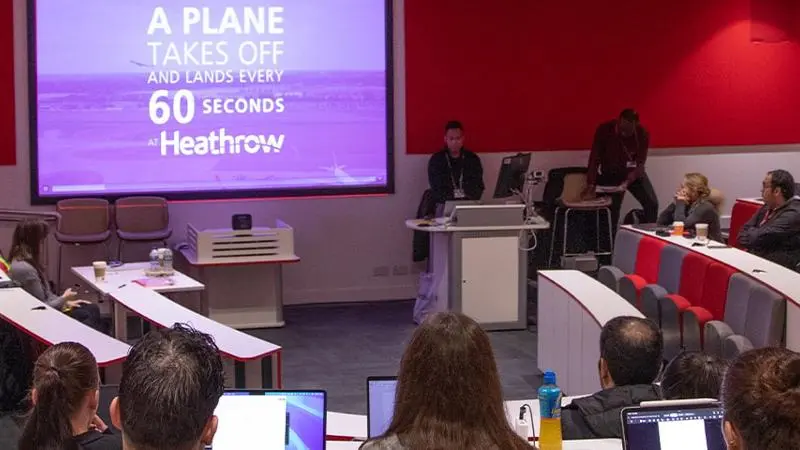 Image of students lecturer theatre with Heathrow Airport guest speakers
