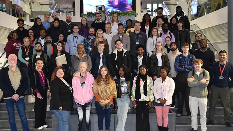 Students, staff and Heathrow guests posed for a group photo in the Spark atrium