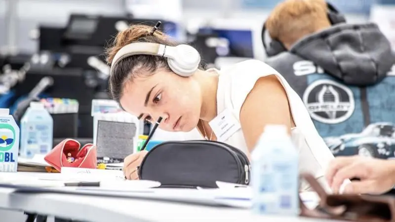 Gaia studying in classroom