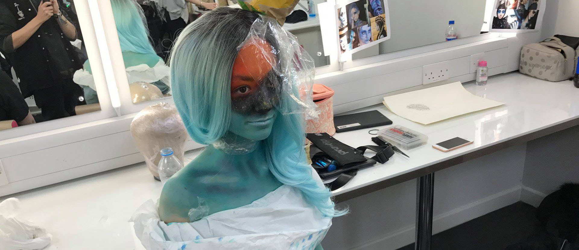 Student with under water prosthetics on her face