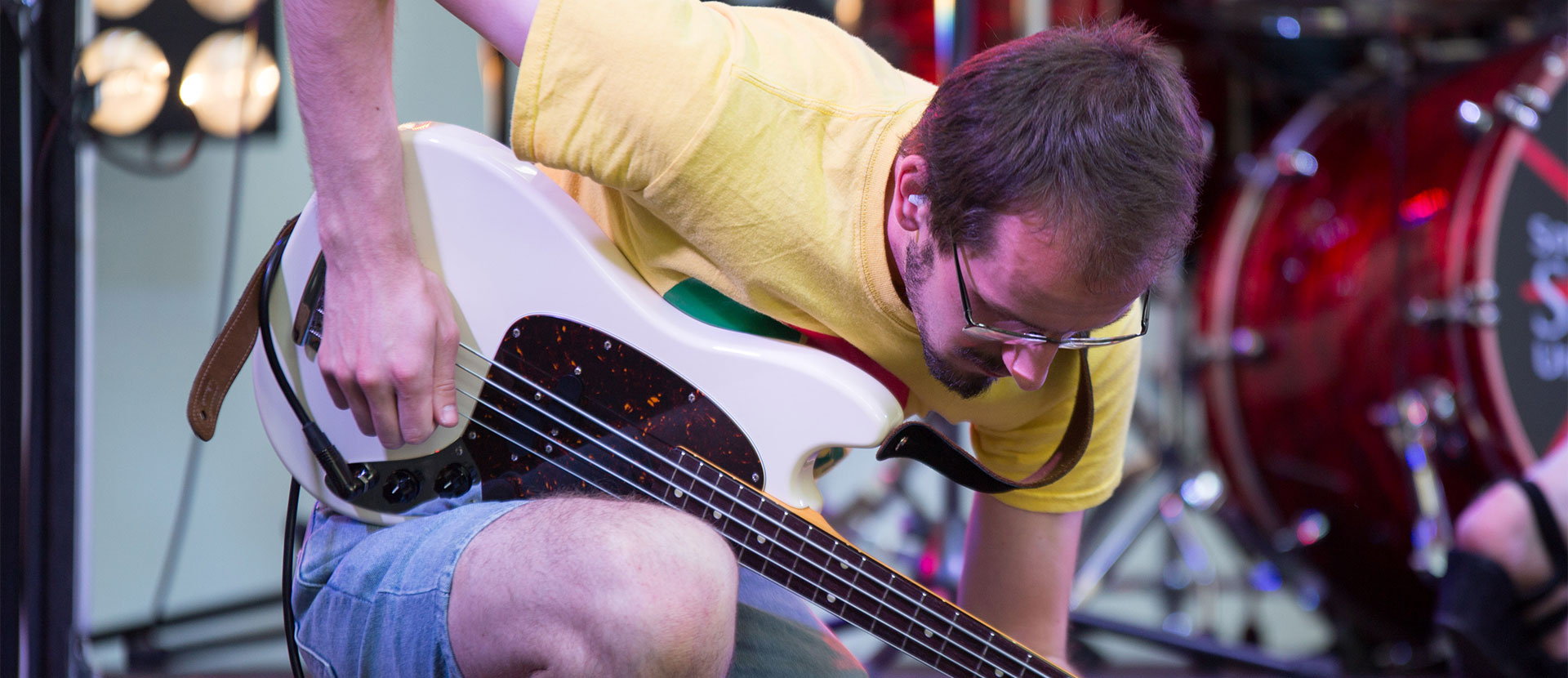 A performer with a bass guitar at the Solent Music Awards