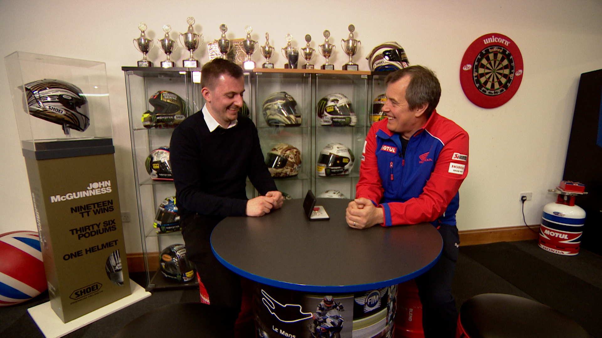 Josh Stokes interviewing veteran motorcycle racer John McGuinness