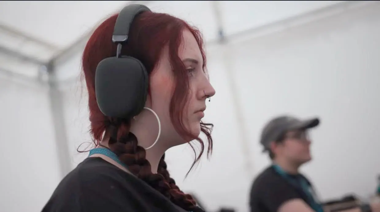 Katie working as a video editor behind the scnes at Boardmasters festival