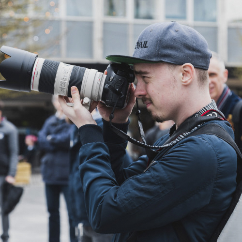 Image of Luke working as a photographer