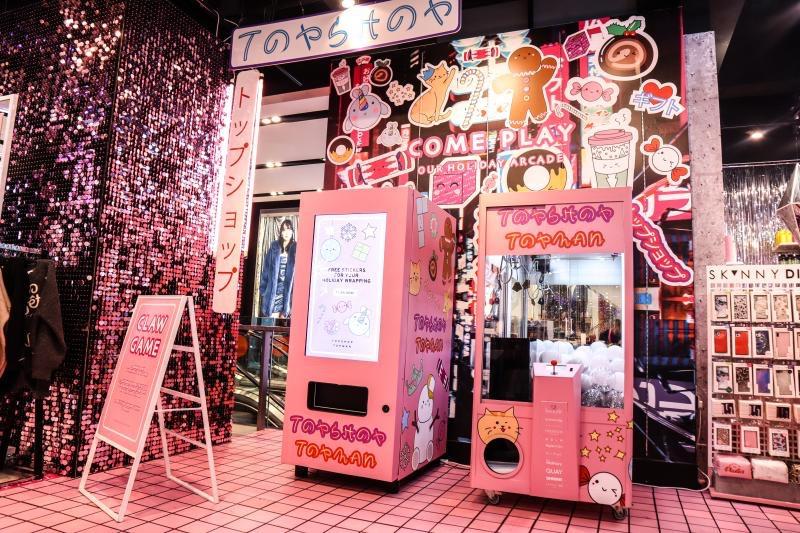 Picture shows an arcade set-up within a Topshop store