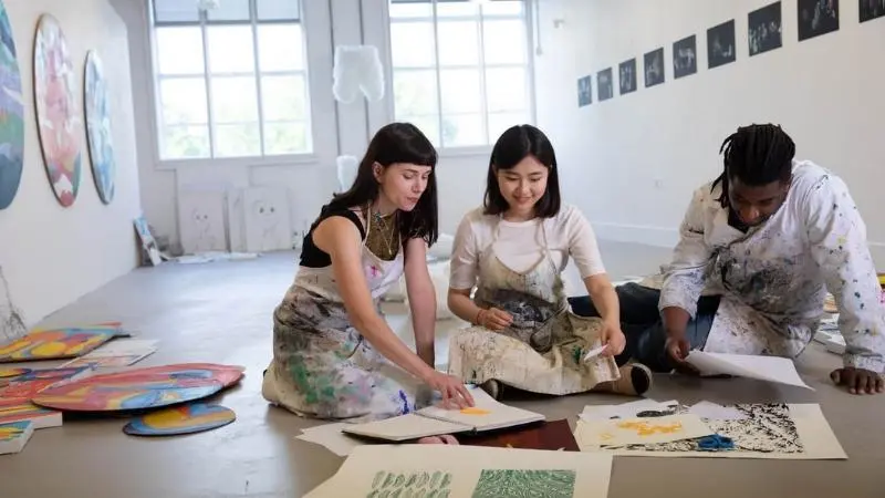 A group of students working on art pieces