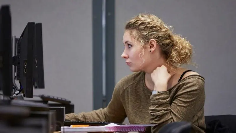 A female student using a computer