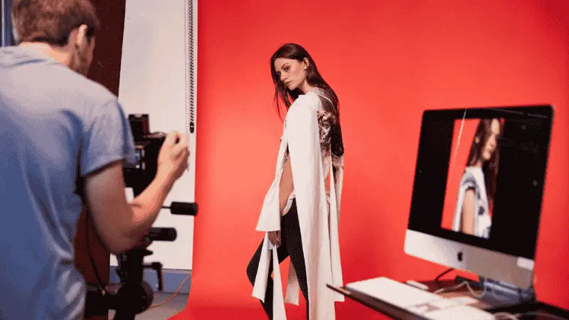 A fashion model posing in front of the camera