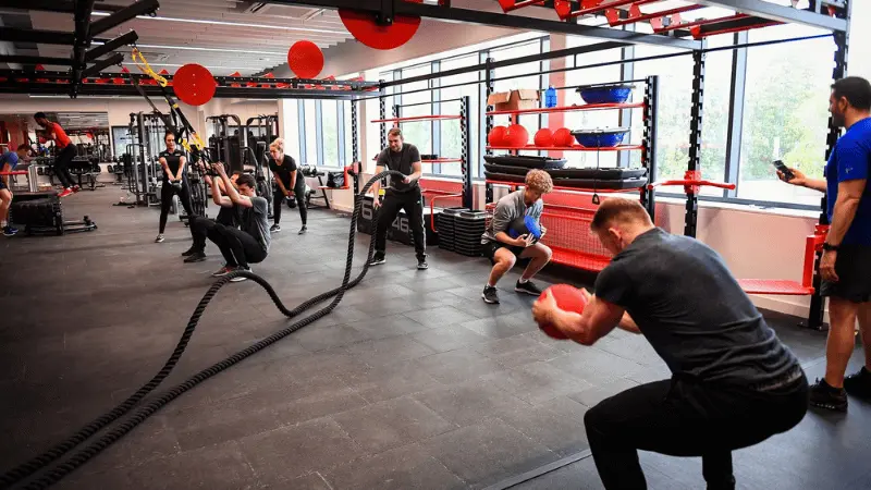 A group of people working out in the Solent Gym.