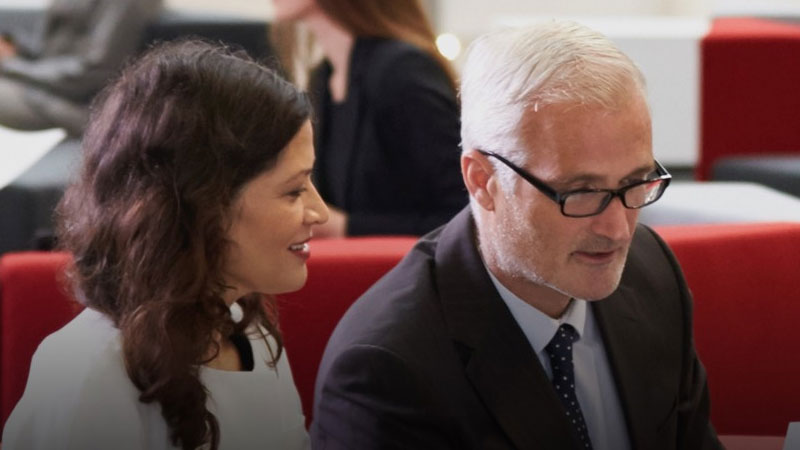 Four people sitting together having a meeting