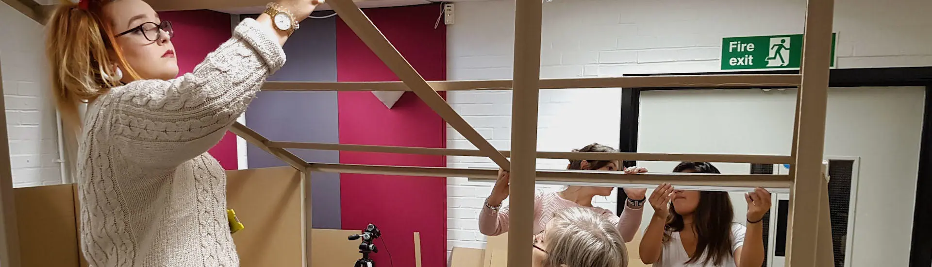 Design foundation year students building a beach hut for a project