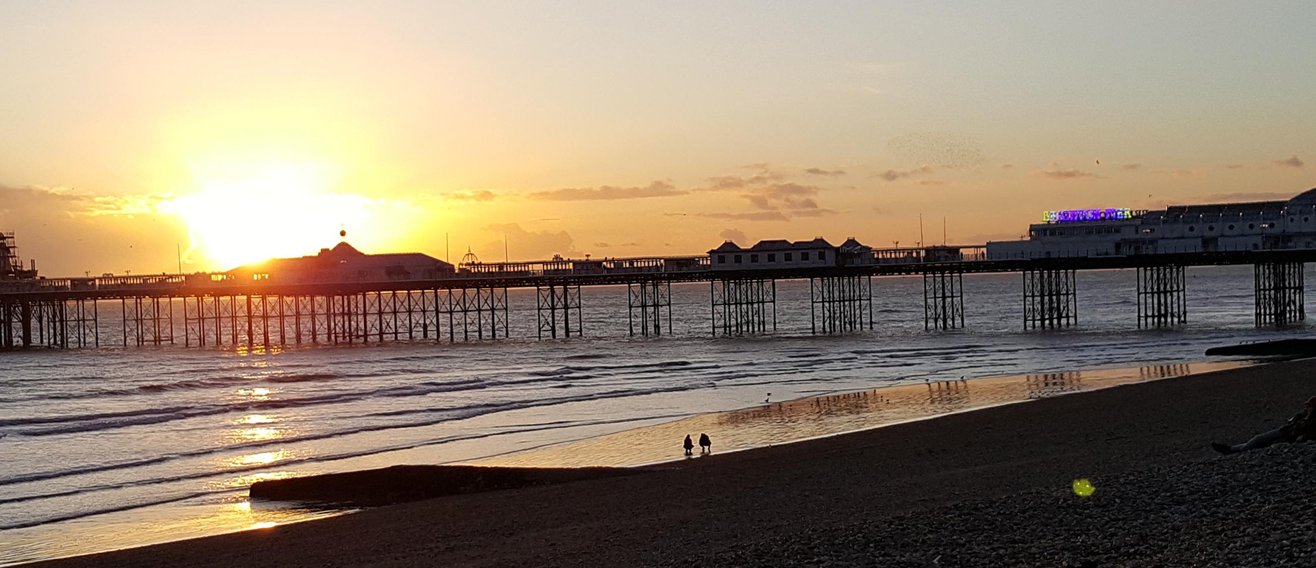 A sunset view of Brighton Pier