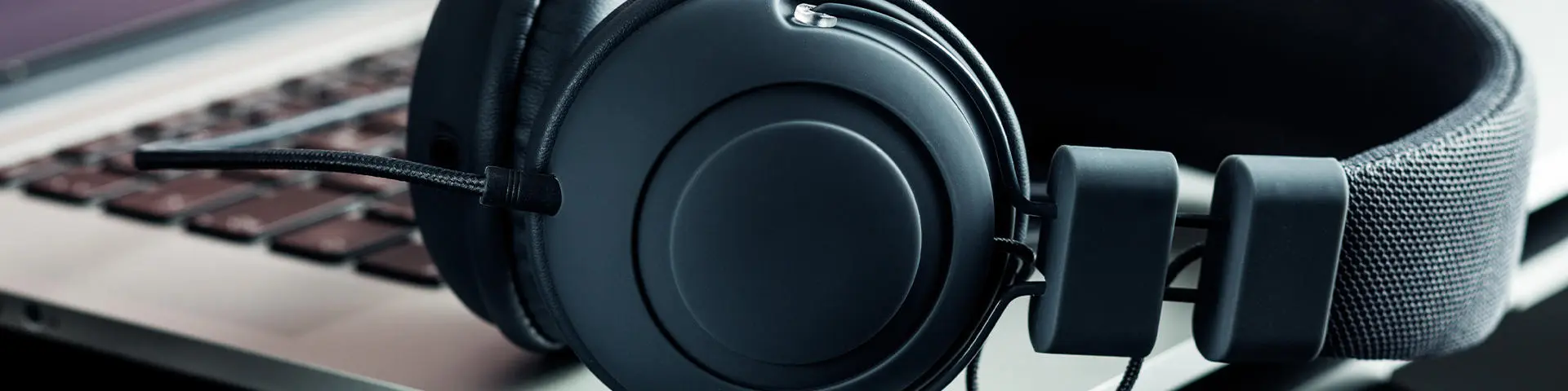 image of laptop and headphones