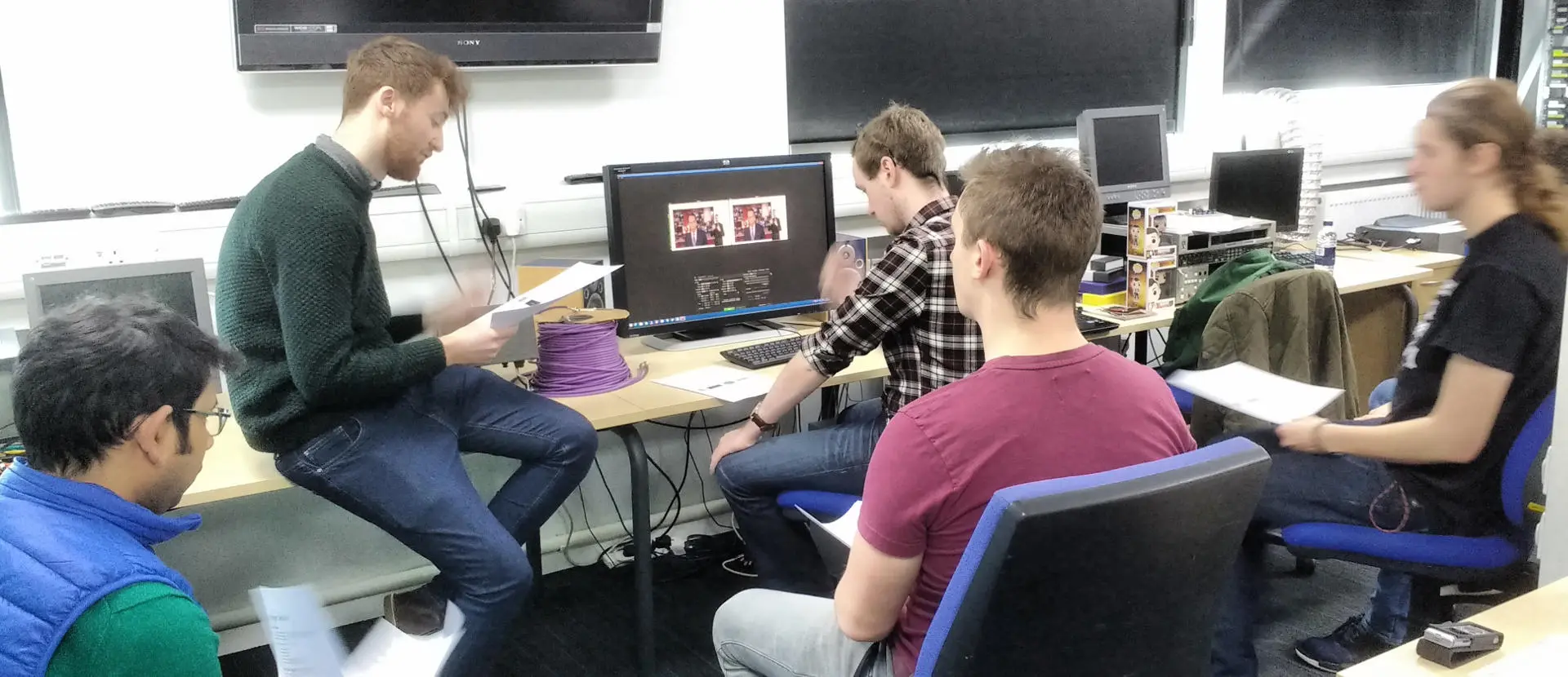 Students watching a  demonstration of cloud video distribution