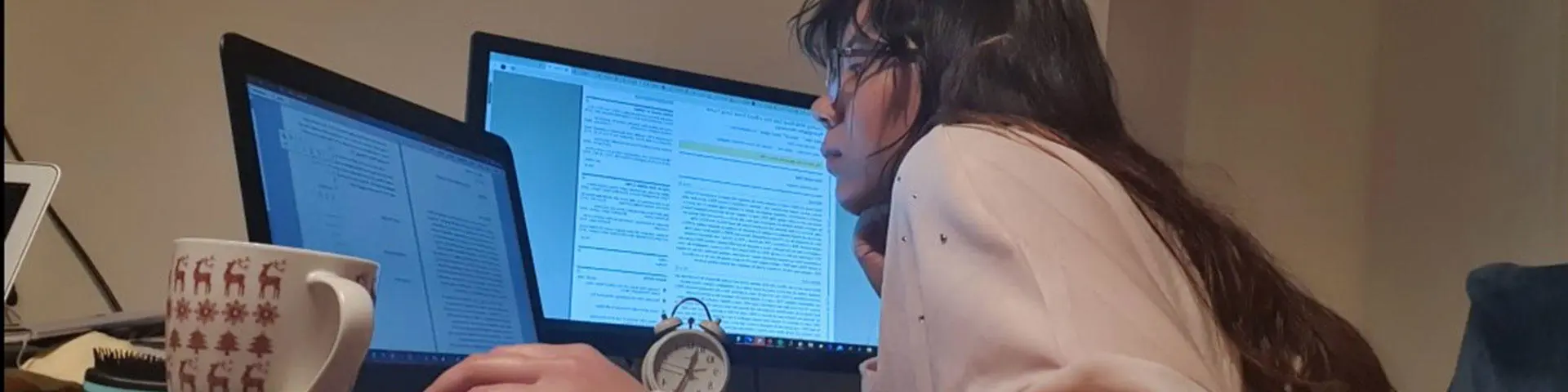 Student blogger, Elena studying at her desk at her parents' house