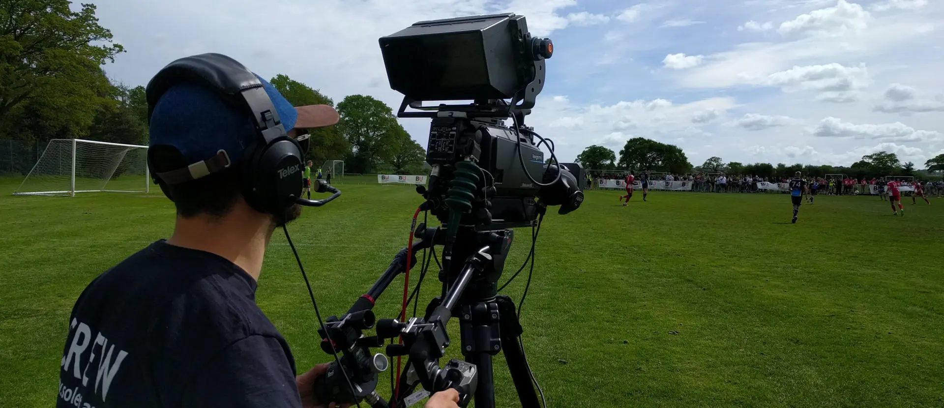 Student filming at Varsity 