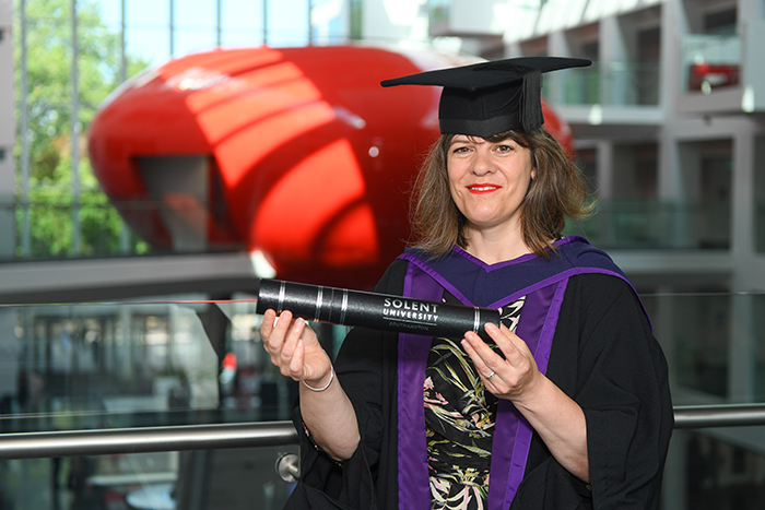 Alison Howell with her degree in The Spark