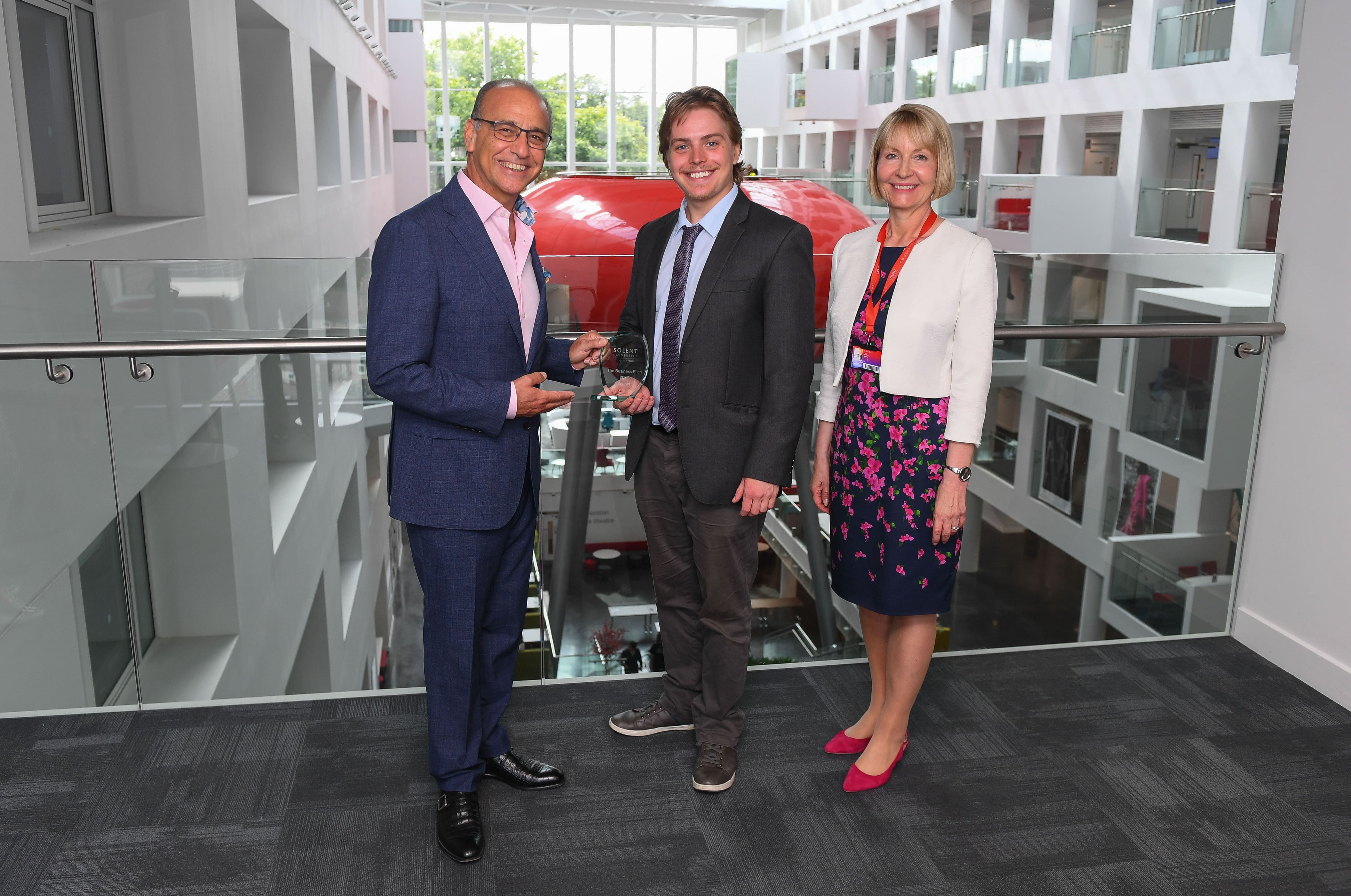 The winner Mitch Wisniewski with retail entrepreneur and TV Dragon Theo Paphitis and Solent Vice-Chancellor Professor Karen Stanton