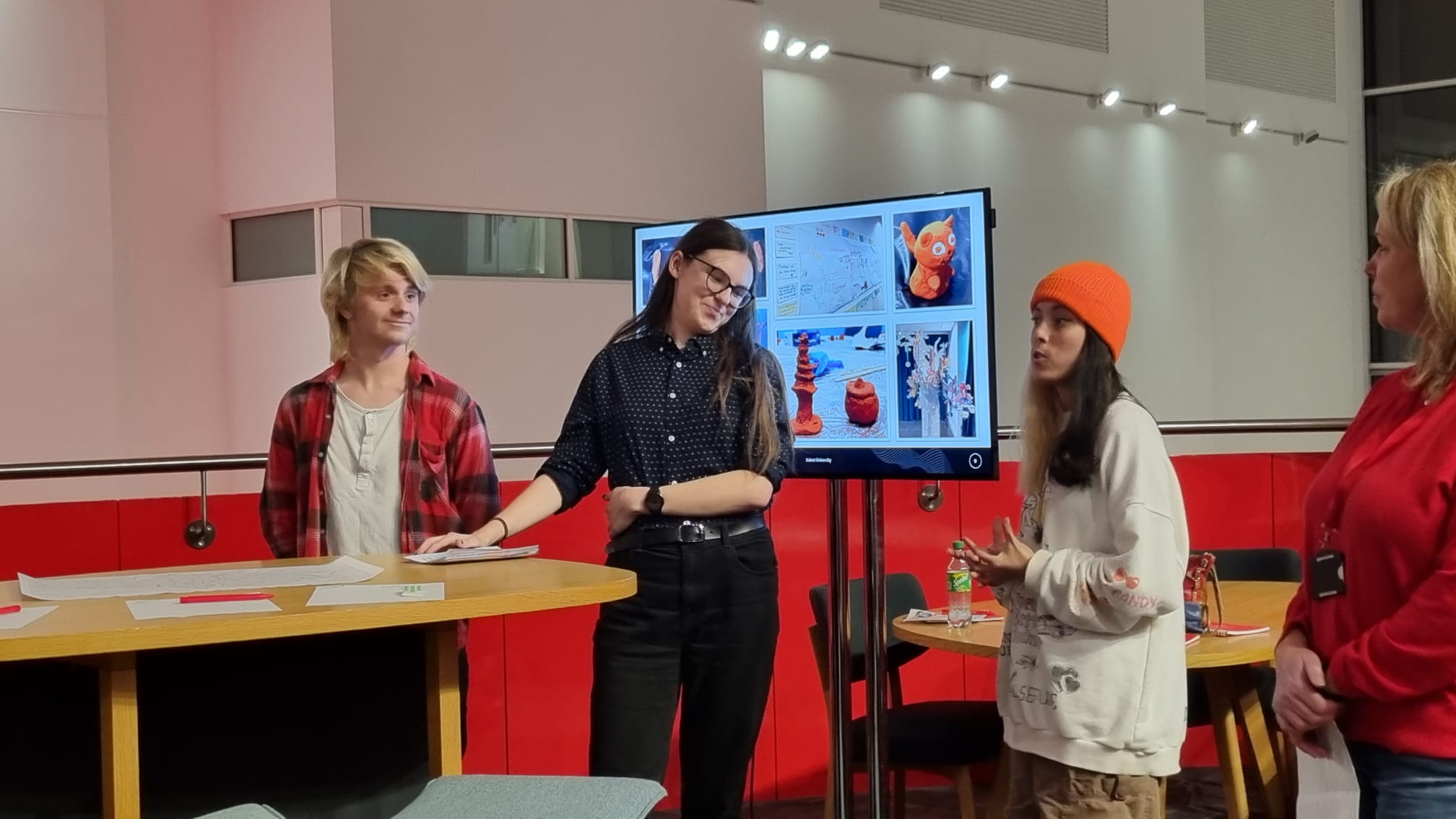 BA (Hons) Acting and Performance students, Rebecca Leonard, Benjamin Seed, and Georgia D'Cruze telling the Civic Exchange Network event attendees about their live brief, Hopes & Dreams