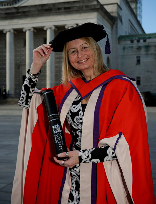 Francesca Berriman MBE with her honorary doctorate outside the Guildhall, Southampton