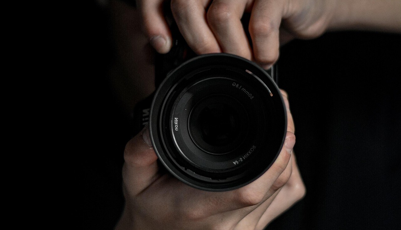 A person taking a photograph