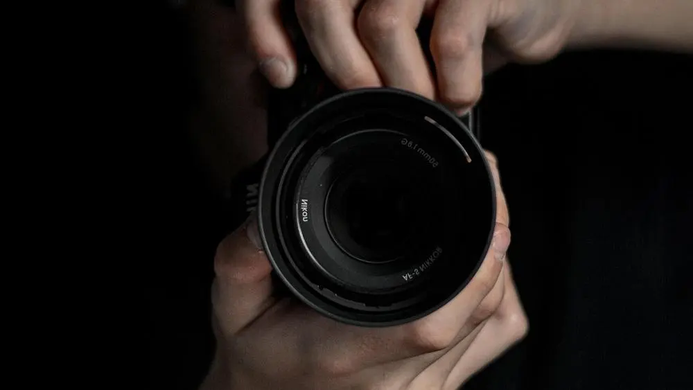A person taking a photograph