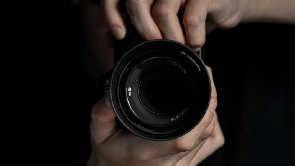 A person taking a photograph