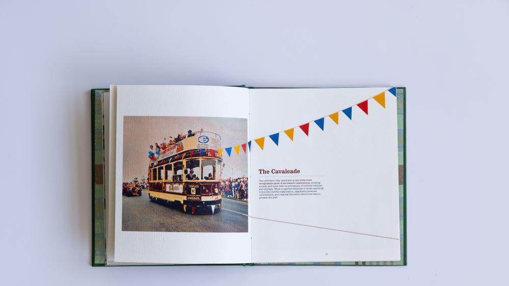 WWII bus in cavalcade on Guernsey liberation day