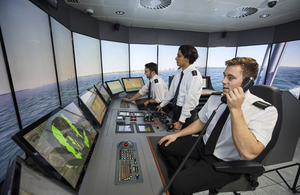 Cadet Officers taking the controls in one of the full mission simulators