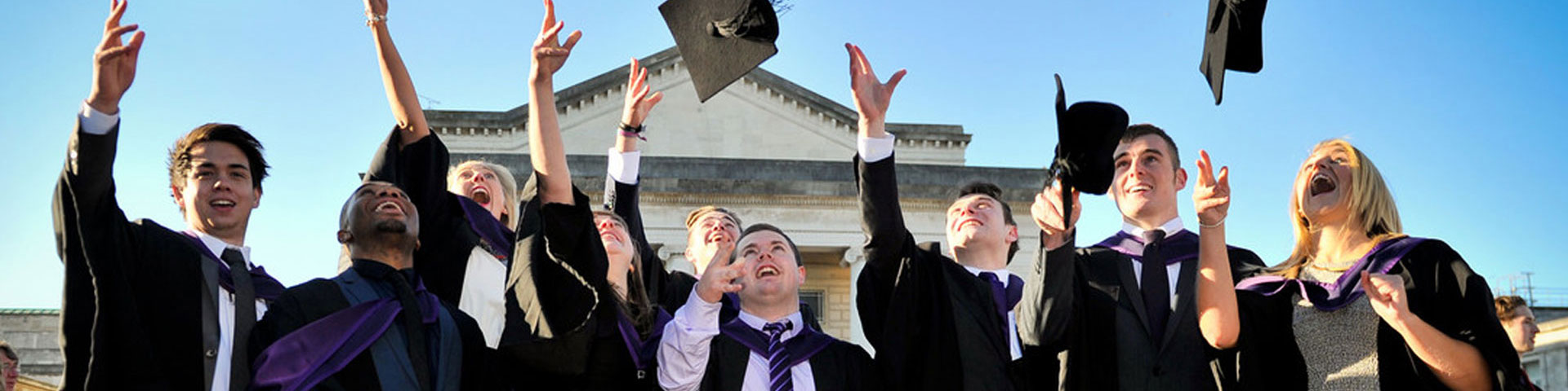 Solent graduates throwing mortar boards