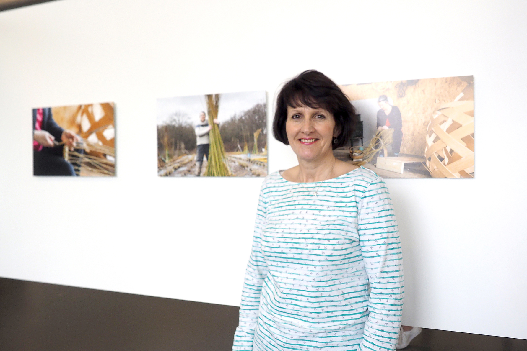 Anne Barratt with some of her photos.